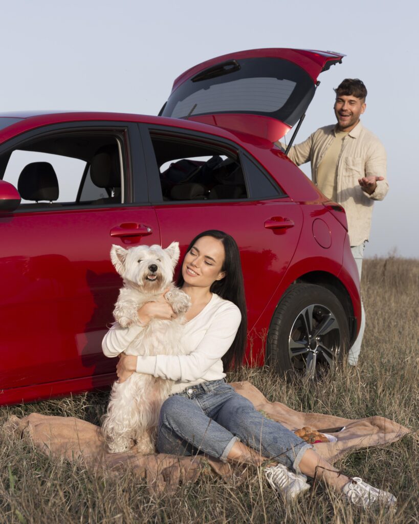 full shot happy couple with dog